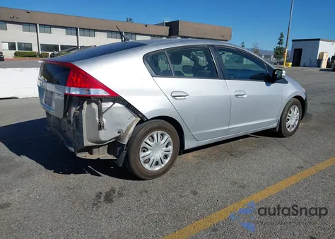 2010 Honda Insight Lx from USA, damaged, VIN JHMZE2H5XAS011239